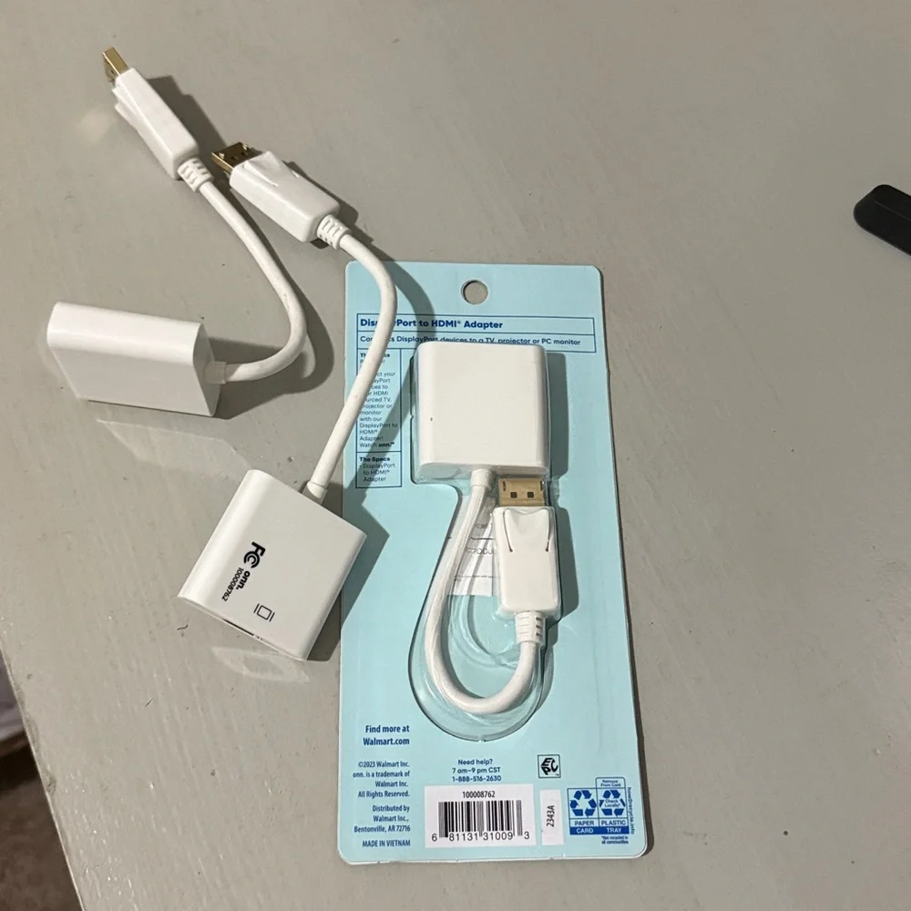 On Running DisplayPort to HDMI Adapter - White